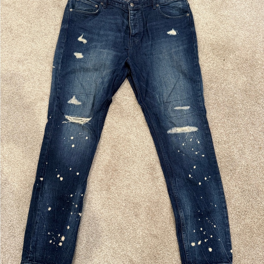Distressed Blue Denim Jeans